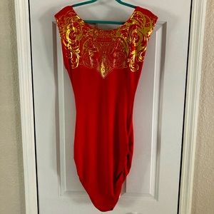 House of Deréon by Beyoncé red dress with gold design on top.